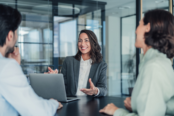 A financial advisor meets with potential clients.